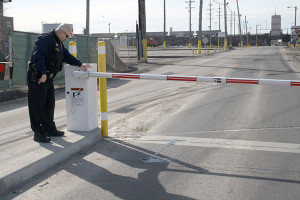 Officer Jerry Conoboy inspects the new security gates.