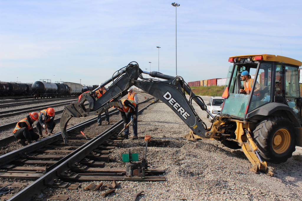 Section crews replace three switch ties where the stock rail did not sit correctly.
