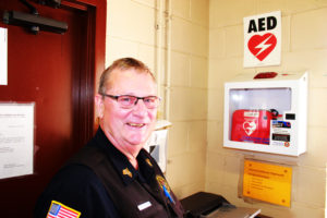 Sergeant Sam Canerday notes the location of an AED.