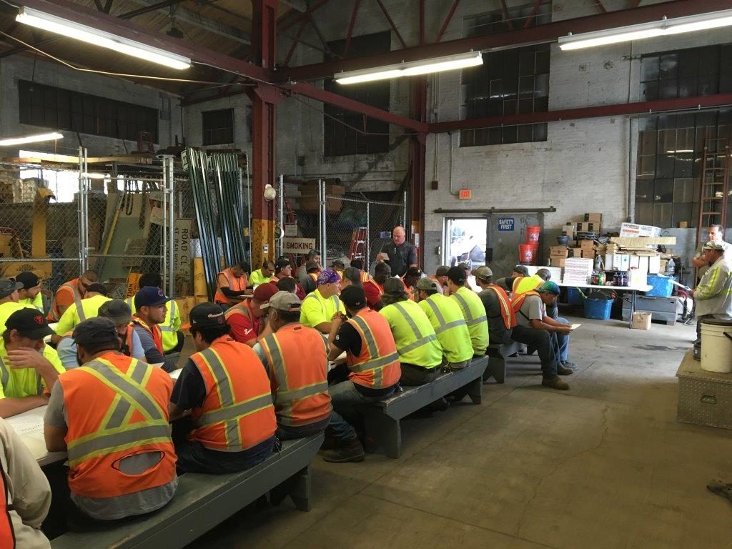 Maintenance of Way employees attend a town hall meeting.